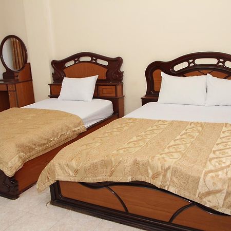 Ngan Long Hotel Ho Chi Minh-stad Buitenkant foto