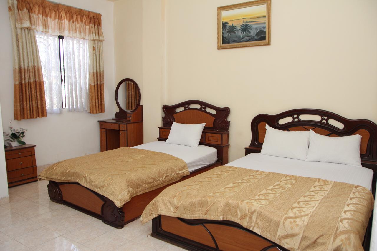Ngan Long Hotel Ho Chi Minh-stad Buitenkant foto