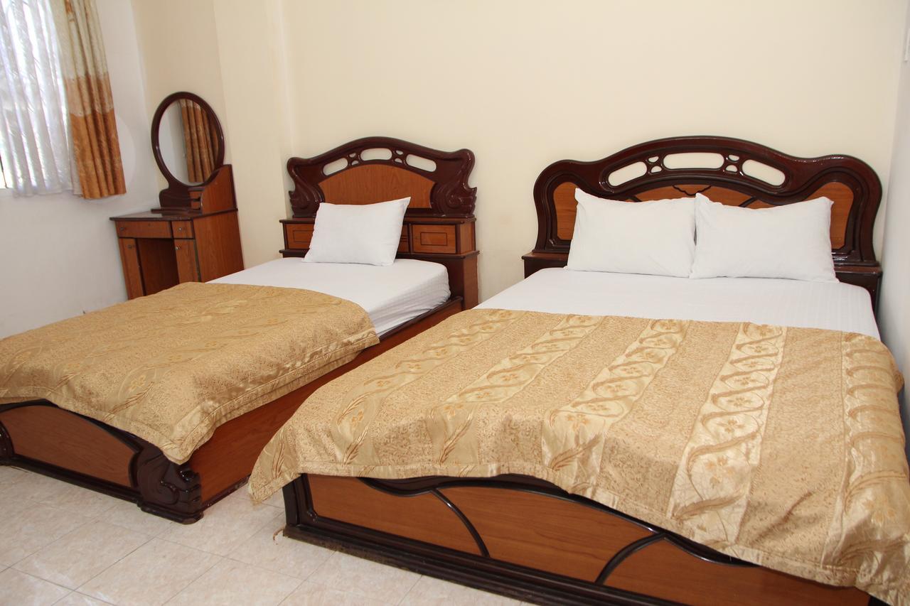 Ngan Long Hotel Ho Chi Minh-stad Buitenkant foto