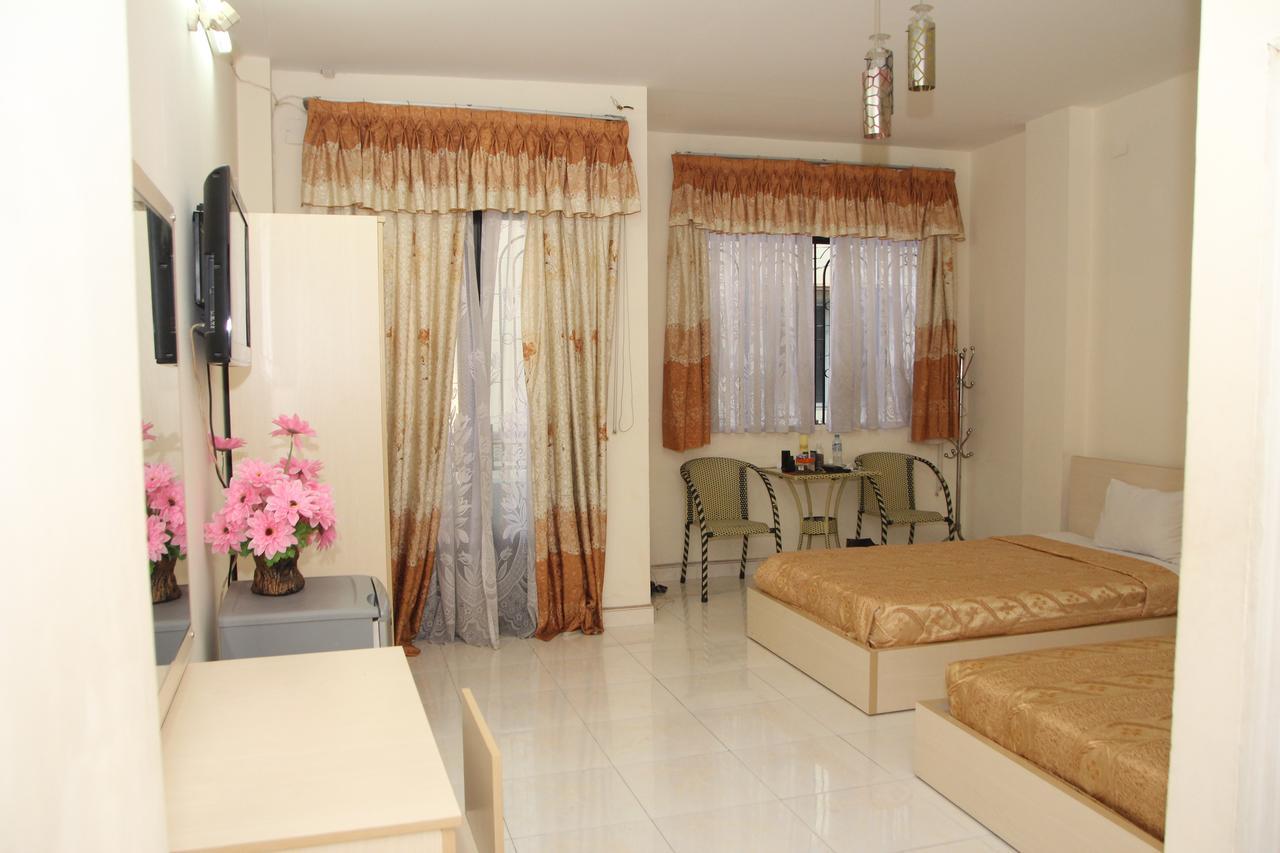 Ngan Long Hotel Ho Chi Minh-stad Buitenkant foto