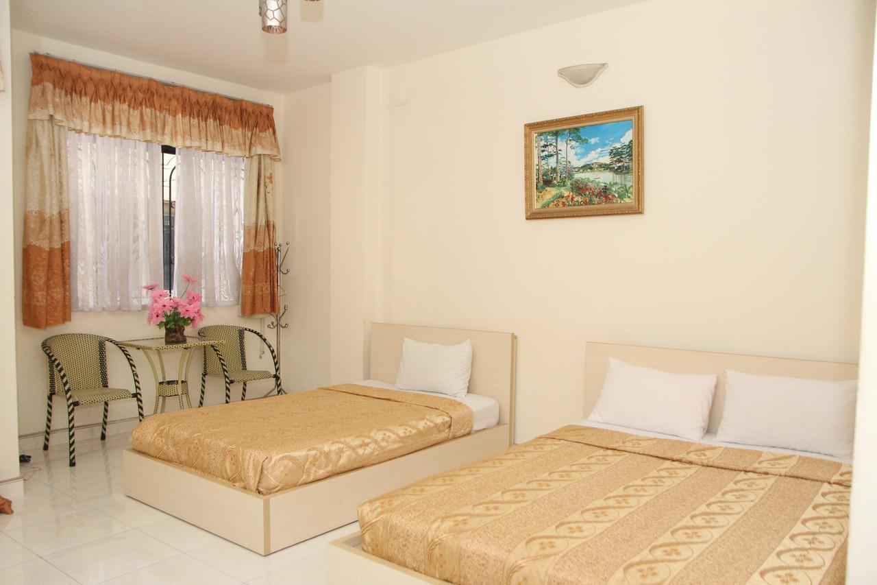 Ngan Long Hotel Ho Chi Minh-stad Buitenkant foto
